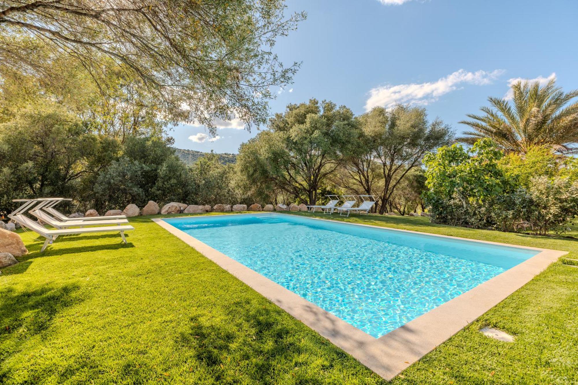 شقة Stazzo San Teodoro Il Ginepro Piscina Condivisa المظهر الخارجي الصورة